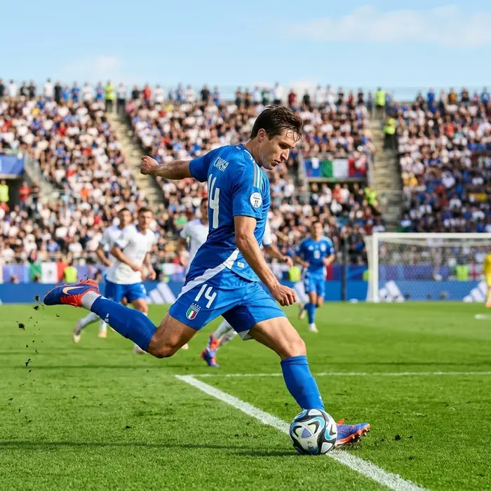 Italian footballer running on the field with digital performance metrics overlaid on screen